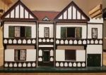 Vintage Tri-Ang Poppenhuis met 50+ meubeltjes